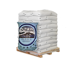 Bags of Magic Salt deicing product piled high on pallet